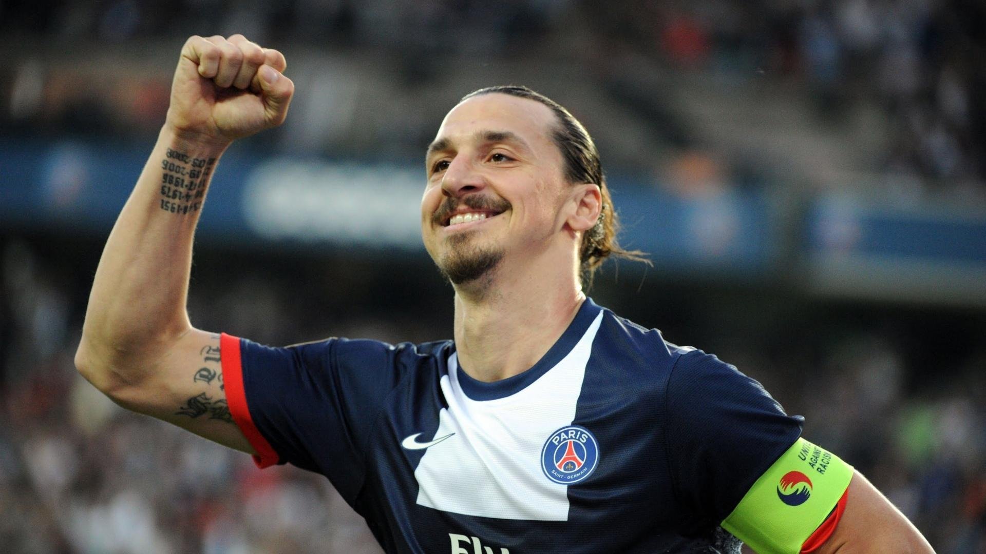 托桑·埃夫布奥姆万在NBA常规赛中贡献11.2分和4.2个篮板，埃托奥和布冯相视一笑